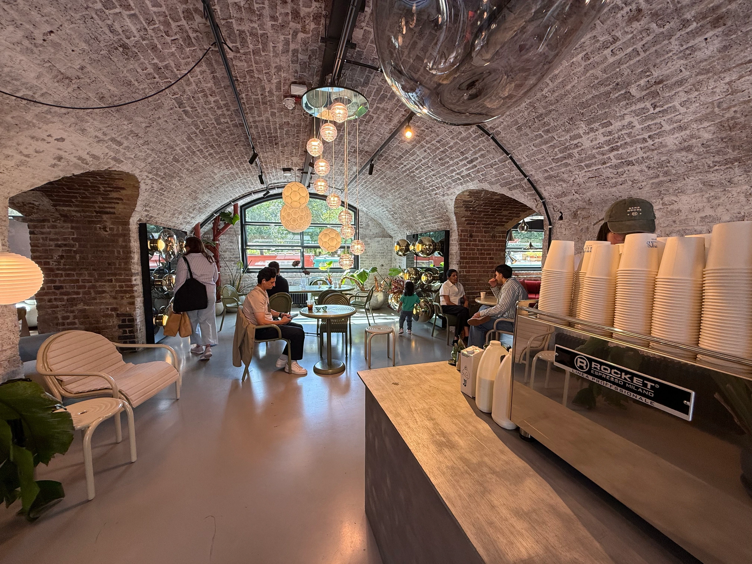 Vaulted brick interior at Tita's Coffee