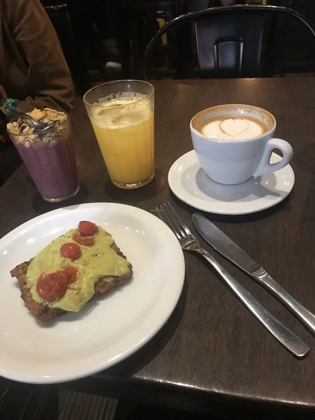 breakfast spread with avocado toast, fresh juice, coffee, and smoothie bowl., urbe cafe bar, são paulo