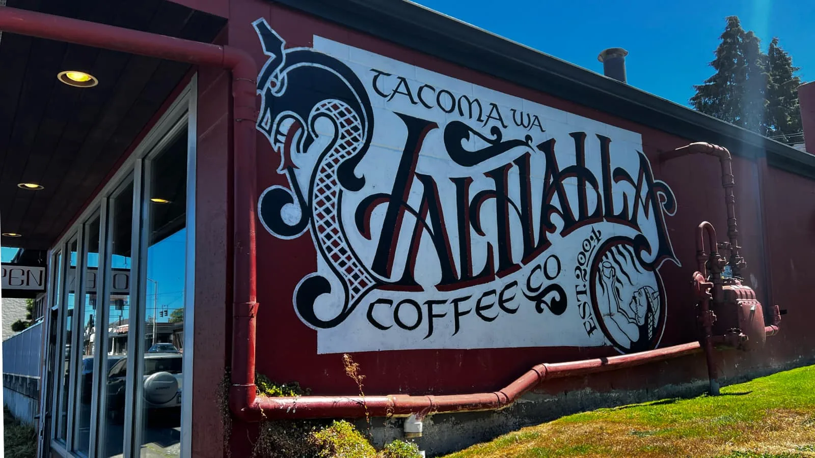 tacoma wa wallingford coffee co storefront with ornate logo signage and entrance., valhalla coffee co., tacoma