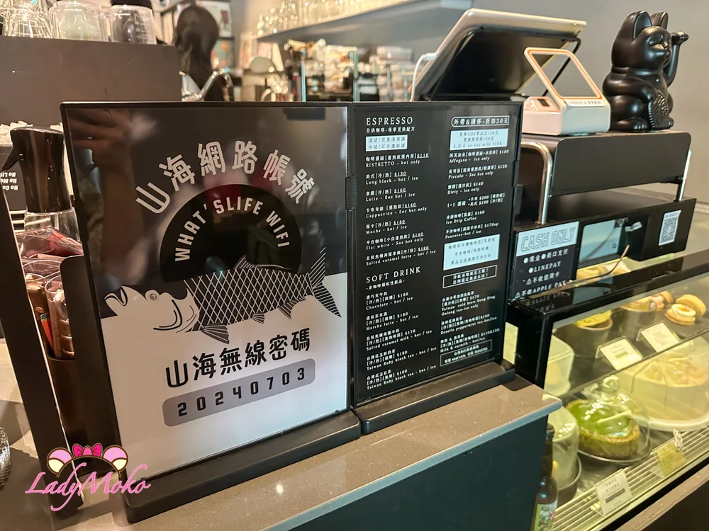 coffee shop counter with menu boards, espresso machine, and lucky cat figurine., what’s life coffee roasters, taipei