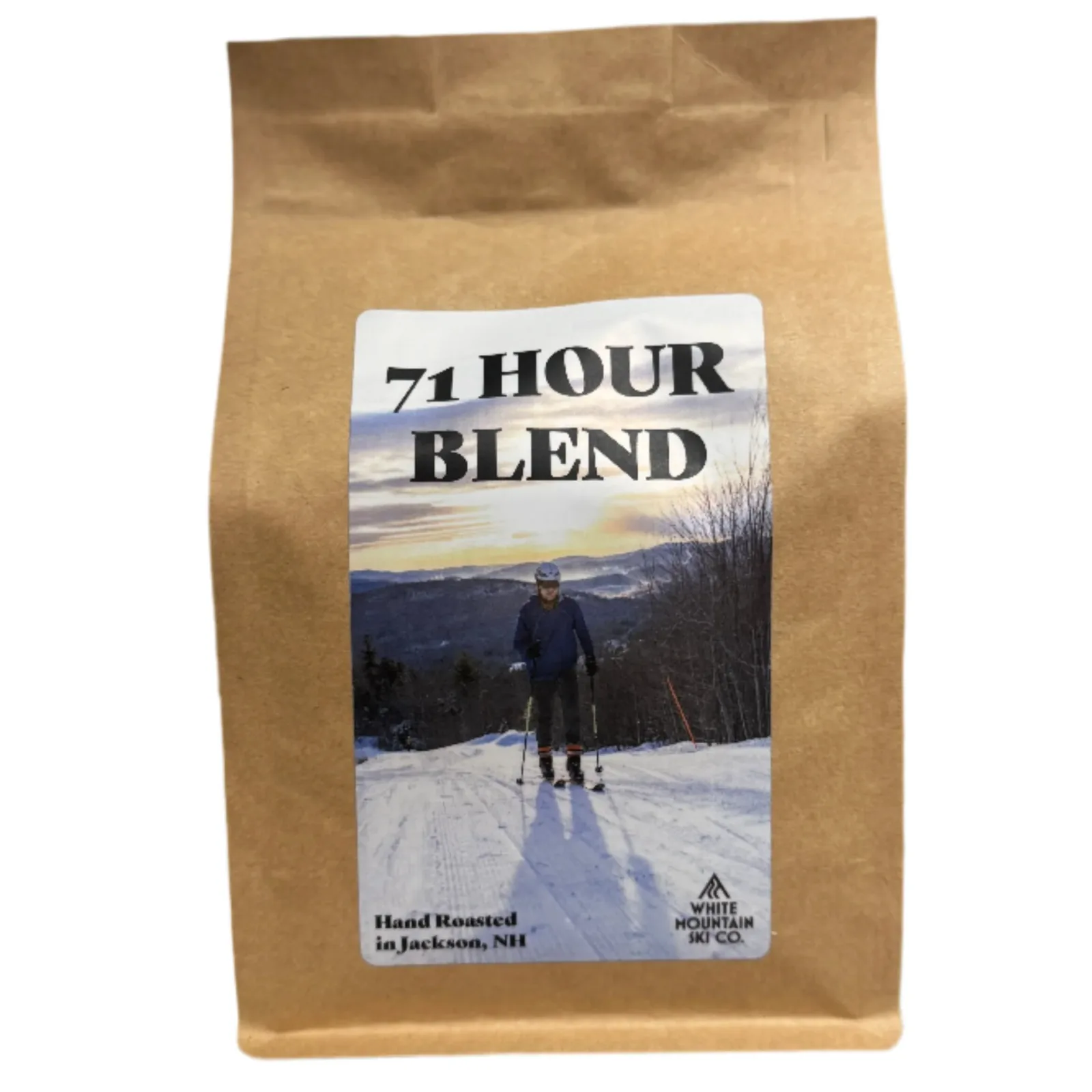 brown kraft coffee bag labeled "71 hour blend" with skier on snowy mountain landscape., white mountain ski co., jackson