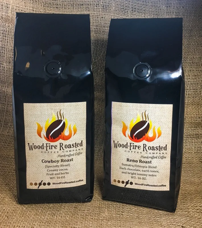 two black bags of wood-fire roasted specialty coffee on burlap fabric., wood-fire roasted coffee company, reno