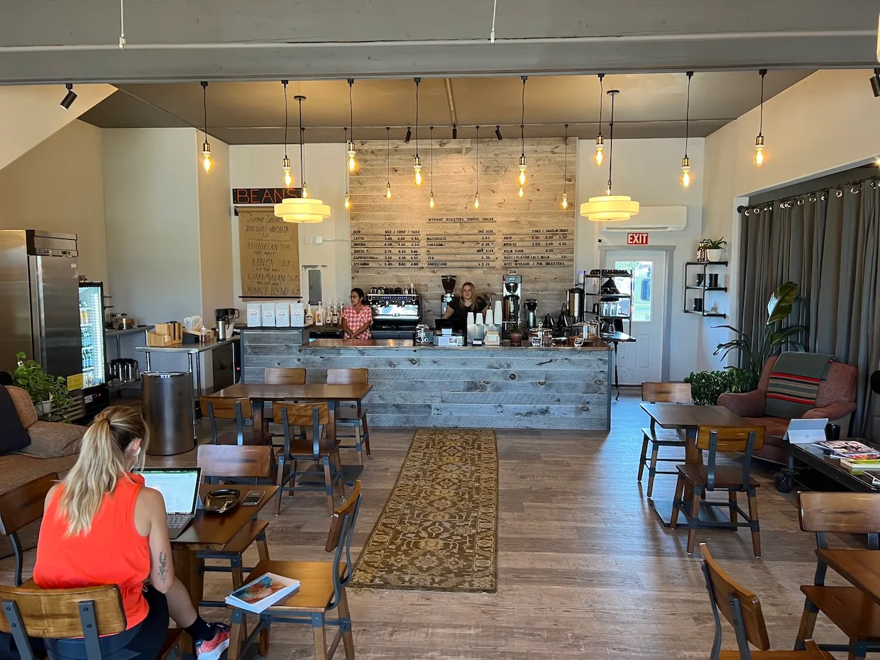 modern coffee shop interior with counter service, pendant lighting, and wooden seating area., wydaho roasters, driggs
